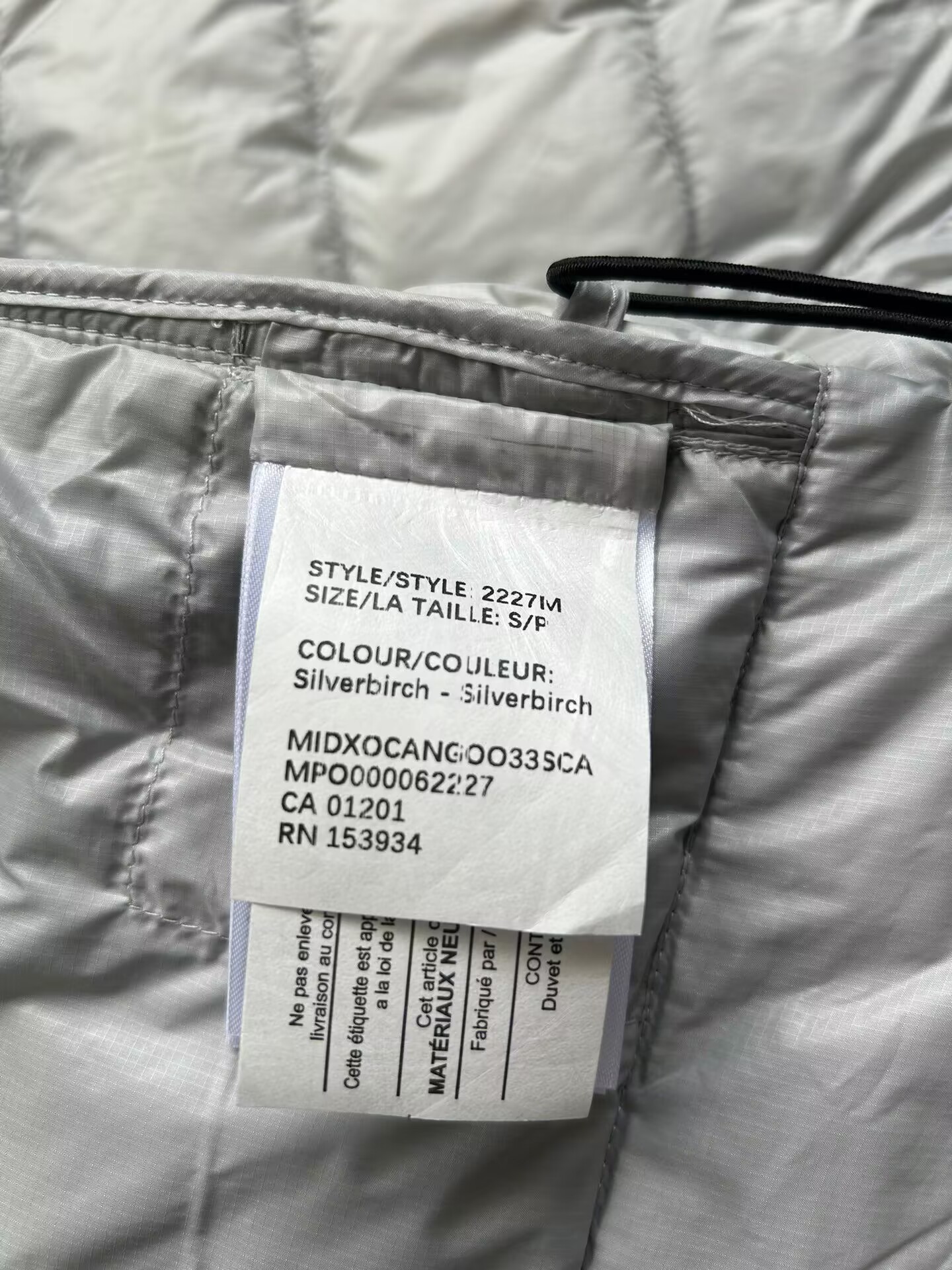 Can*a Go*e coat-261
