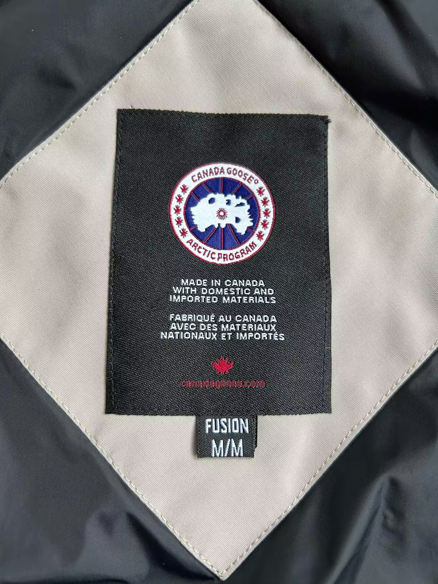 Can*a Go*e coat-251