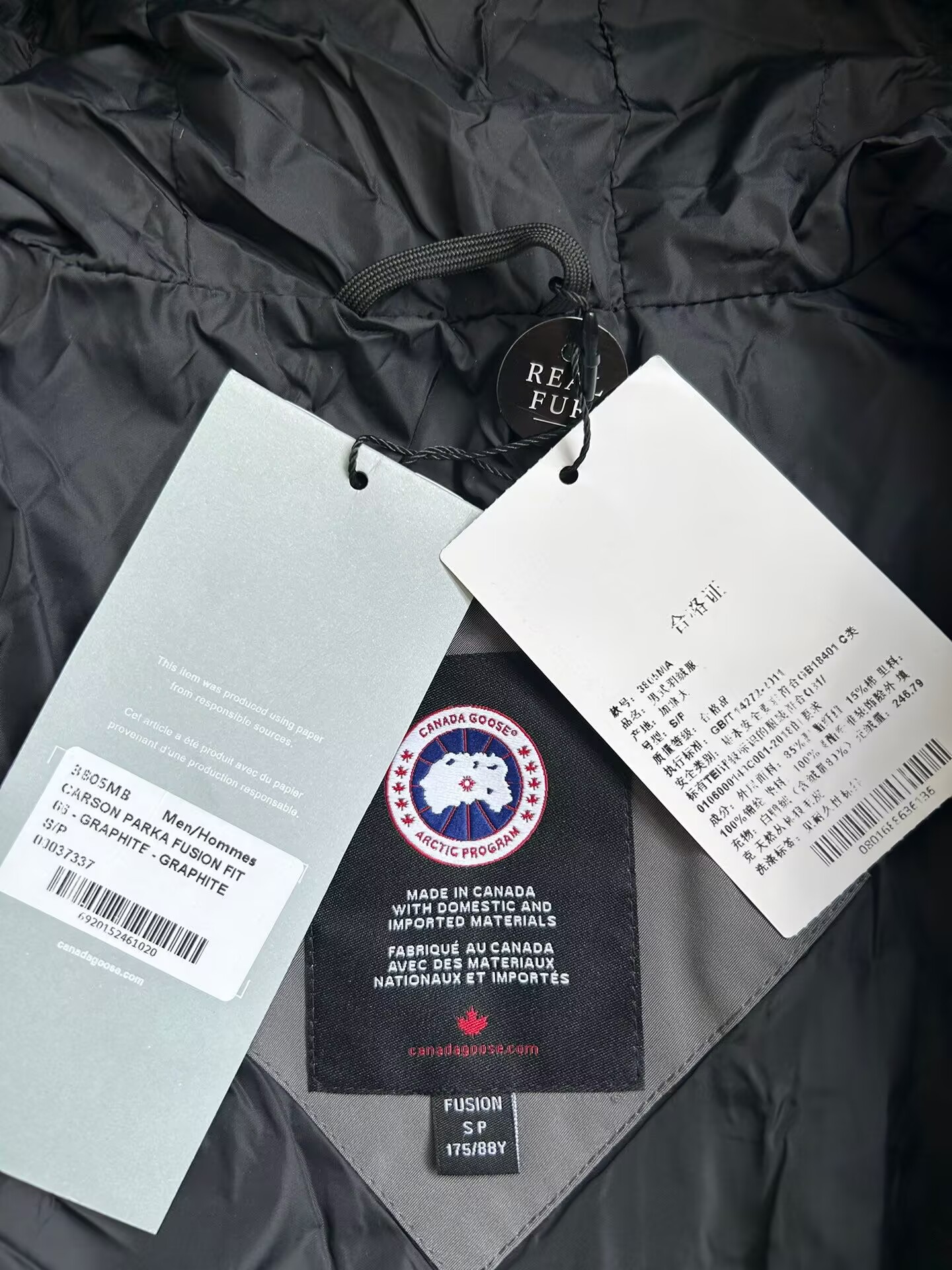 Can*a Go*e coat-382